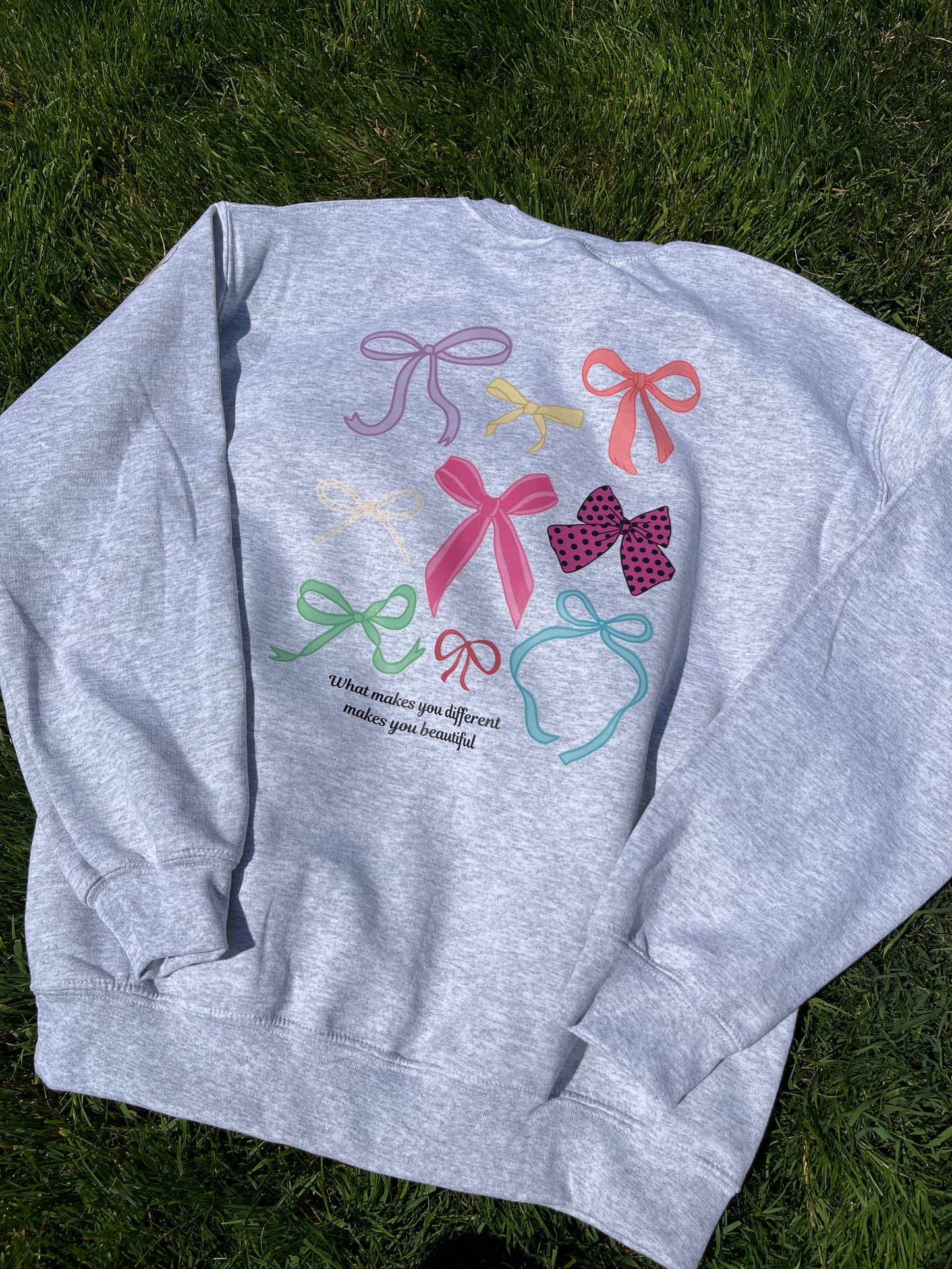 Different not less Bow sweatshirt